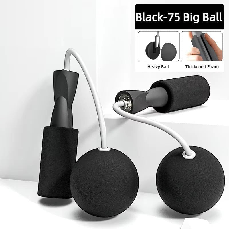 TBF Home fitness black cordless jump rope with weighted balls and thickened foam handles for speed and cardio training.