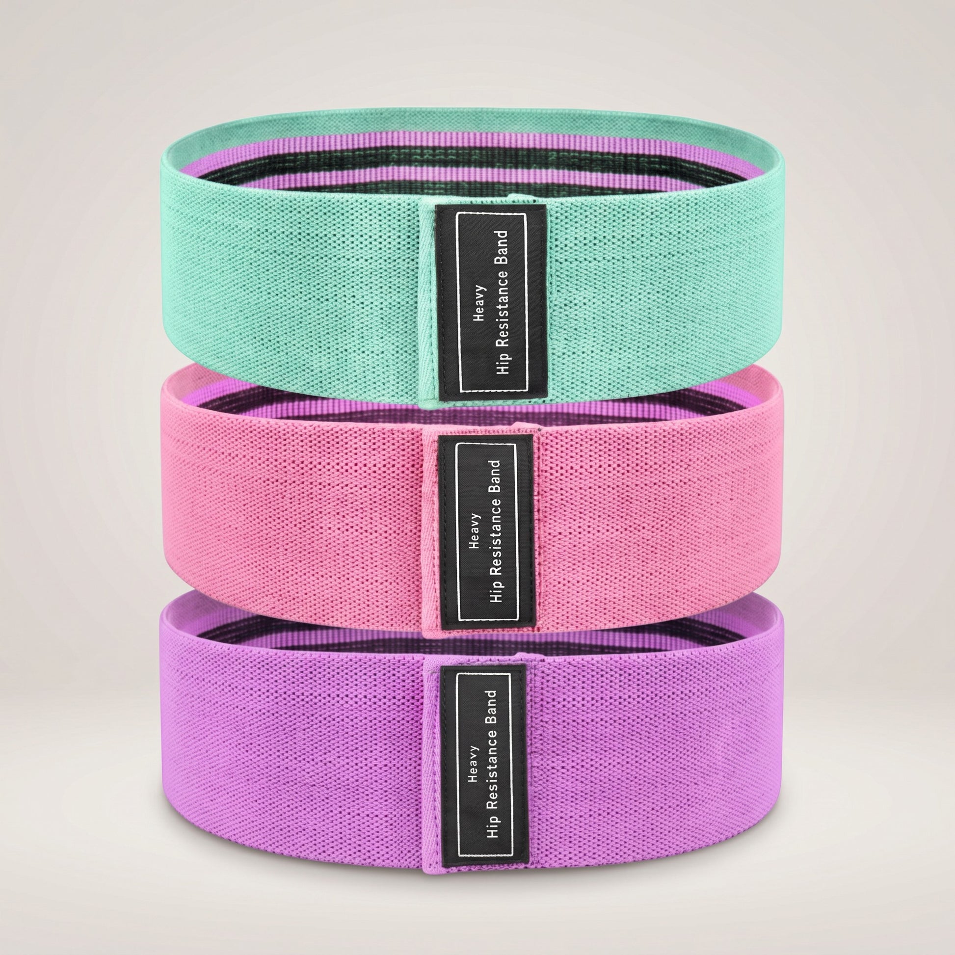 TBF Home Fitness heavy hip resistance bands in mint, pink, and purple for lower-body workouts.