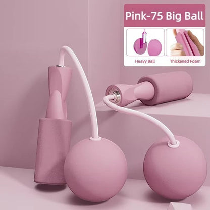TBF Home fitness pink cordless jump rope with weighted balls and thickened foam handles for speed and cardio training.