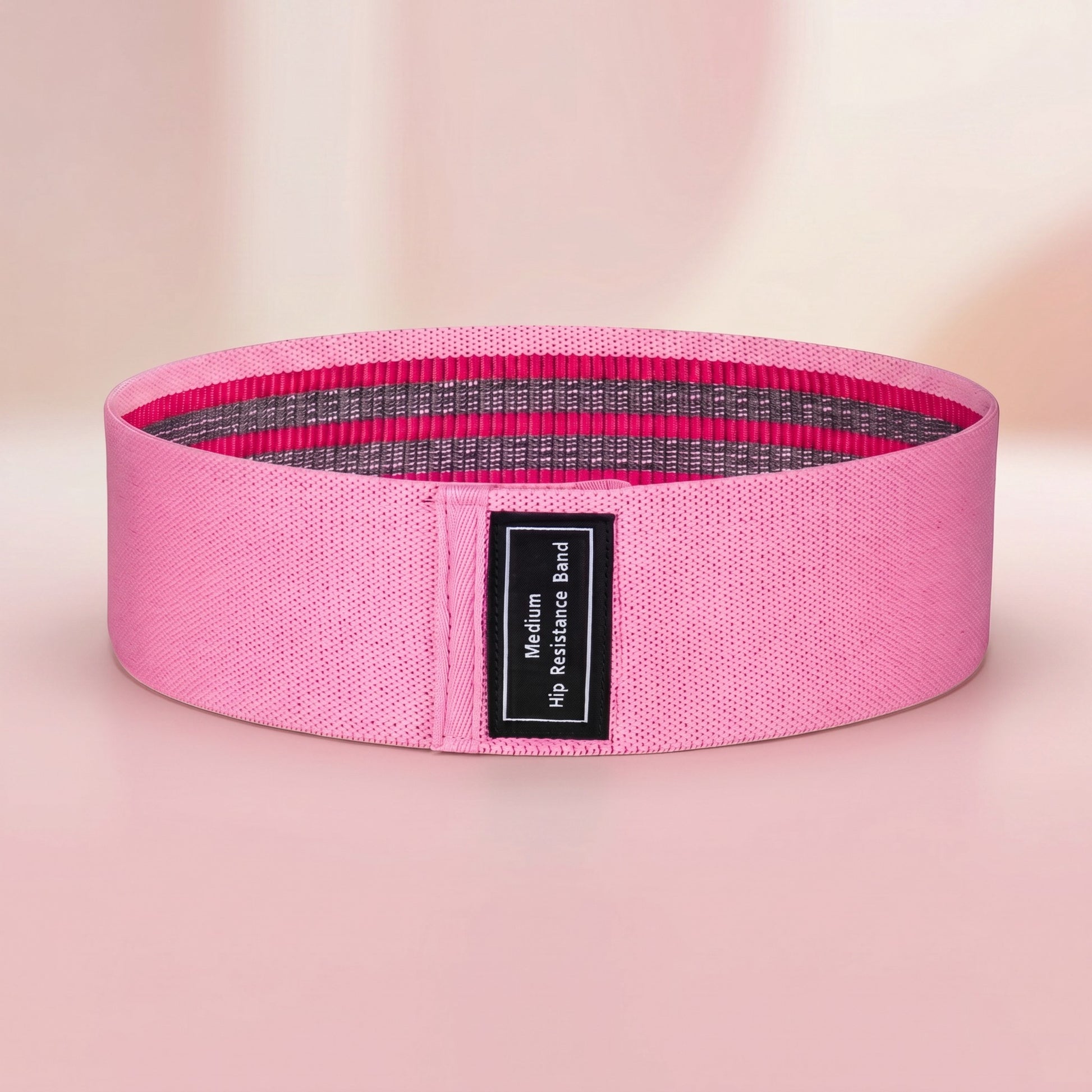 TBF Home fitness pink fabric hip resistance band with grey and pink stripes, size medium.
